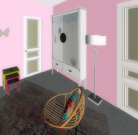 chambre bébé - vue arrière du rocking chair en direction de la porte. mur rose et armoire enfant blanche décorée style japon.